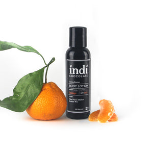 indi chocolate Orange Body Lotion -2 oz - Made with the same cocoa butter we use to make our bean to bar chocolate, this lotion is a real treat. Made with great ingredients, this lotion absorbs well without leaving a greasy residue. Great for everyone on your list, including you. Great for individual, corporate, holiday and gift giving.