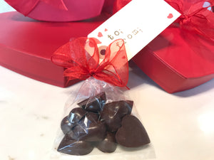 Have a dark chocolate  heart made from bean to bar by indi chocolate in Seattle's iconic Pike Place Market. The indi chocolate factory is located at the top of the Overlook Walk.